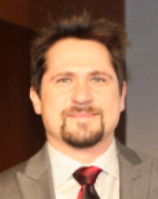 headshot of Charles Ambrass