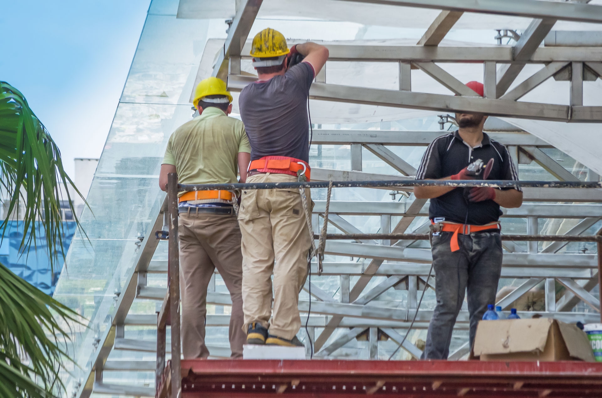  Construction workers building support structure for a building  