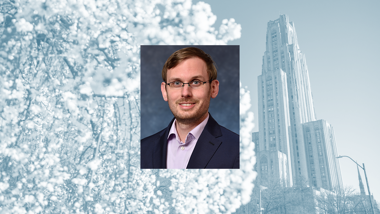Mathew barry in a professional profile image in front of the cathedral of learning