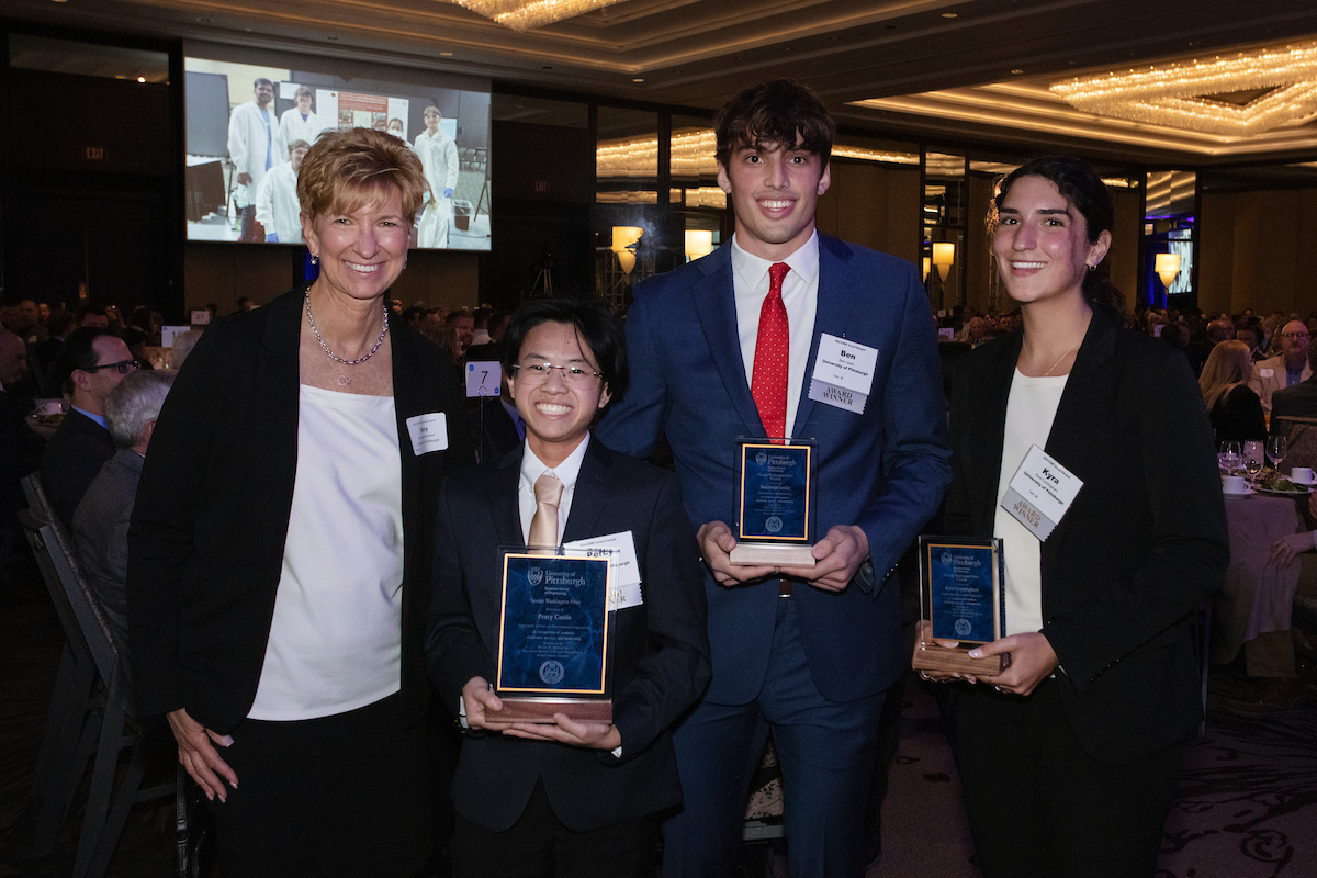 At the 2024 ESWP Awards Banquet from left, Senior Associate Dean for Academic Affairs Mary Besterfield-Sacre, Percy Curtis, Benjamin Leslie, and Kyra Cunningham.