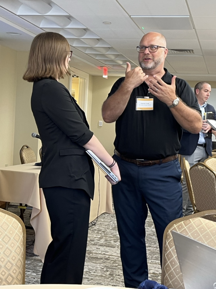 Workshop Connections - Sarah Scheffler and Daniel Cole sharing ideas during a cyber energy workshop. Workshop Connections