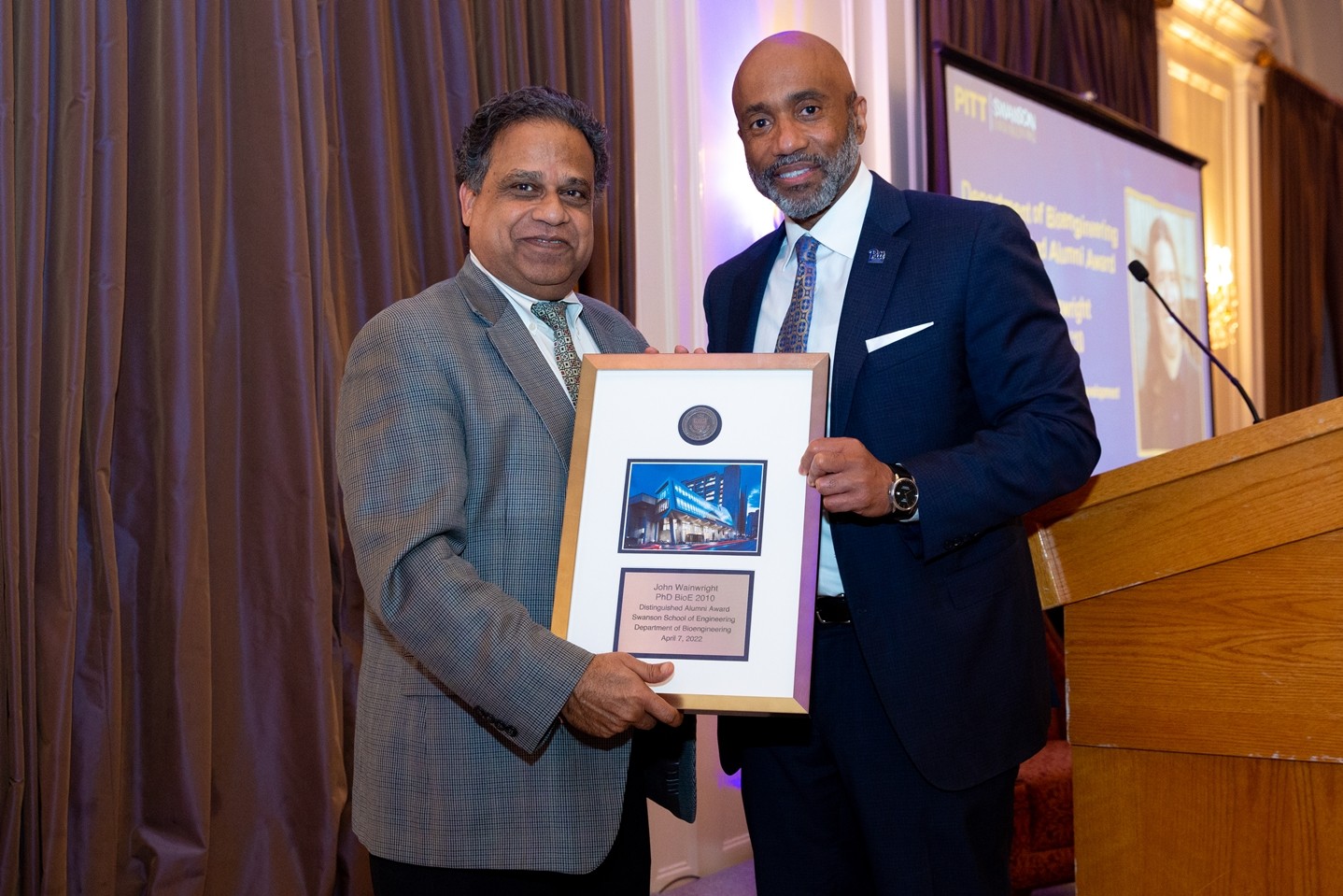 Sanjeev Shroff accepts BioE DAB on behalf of John Wainwright Sanjeev Shroff accepts BioE DAB on behalf of John Wainwright