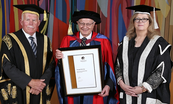 George Klinzing receiving award