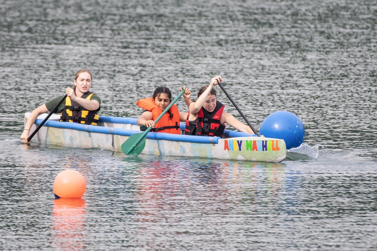 Nationals womens slalom - Swanson School of Engineering students participate in the women's slalom competition at the American Society for Civil Engineers Concrete Canoe Competition held in Tygart Lake, West Virginia. (Photo: Aimee Obidzinski) Nationals womens slalom