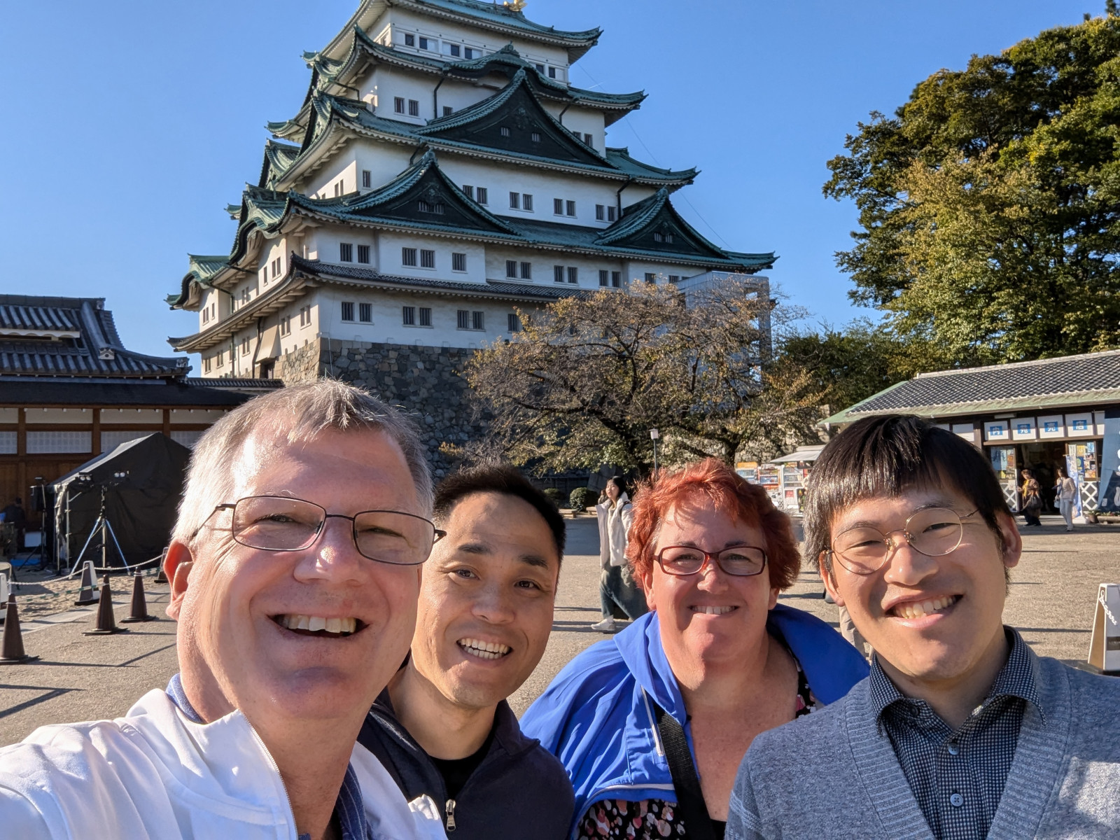 Debski - Richard Debski, Tetsyua Takenaga, Mandy Debski, Tomoya Ono in front of the Nagoya Castle in Nagoya, Japan, on November 7, 2024, during visit to Nagoya City University. Debski