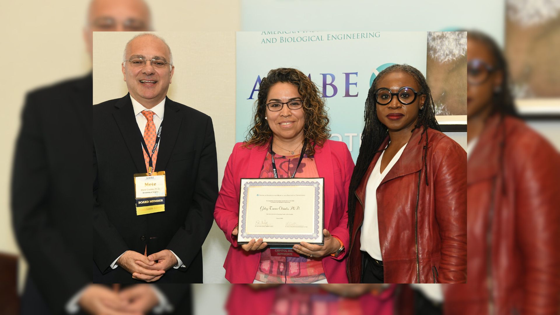 Gelsy Torres-Oviedo pictured with her ceremonial plaque at the AIMBE emerging leaders event