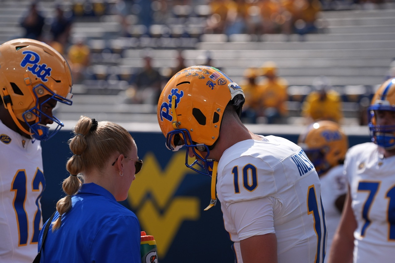 IMG_6085 - Rachel McLoughlin on the field at a Pitt football game IMG_6085