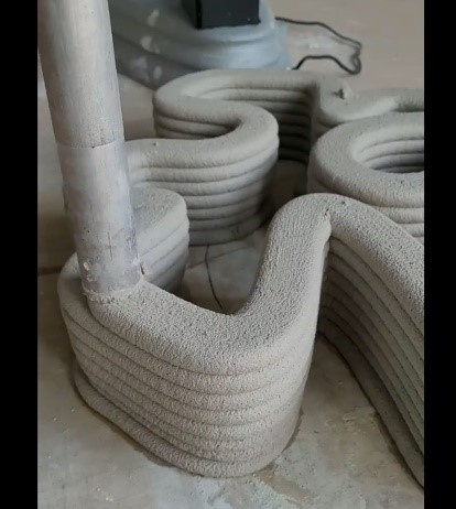 Additive manufacturing printing concrete