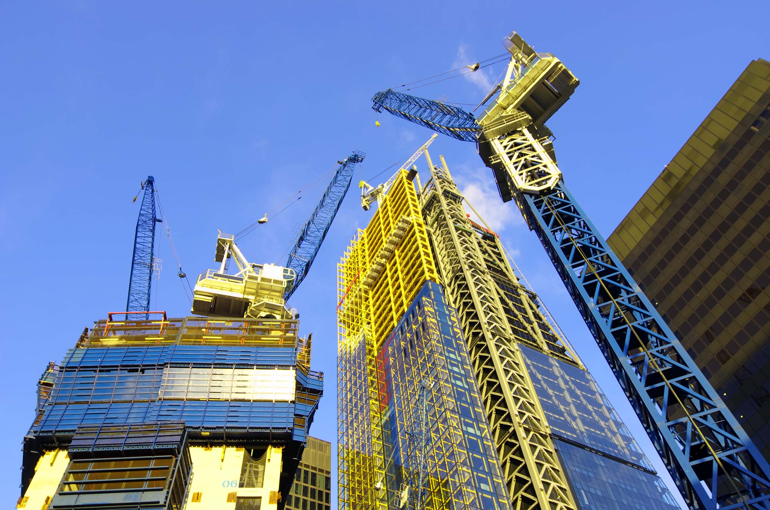 Cranes building a skyscraper
