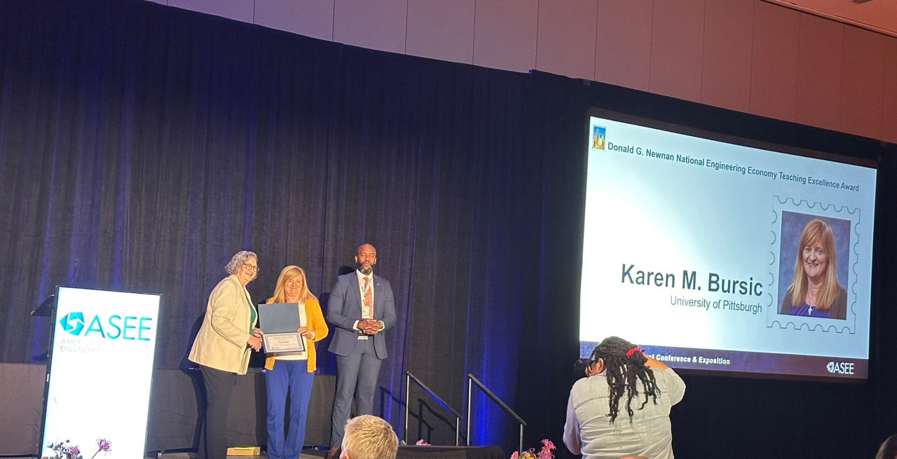 Bursic 1 ASEE - Karen Bursic (second from left) being honored at the ASEE annual conference. Bursic 1 ASEE