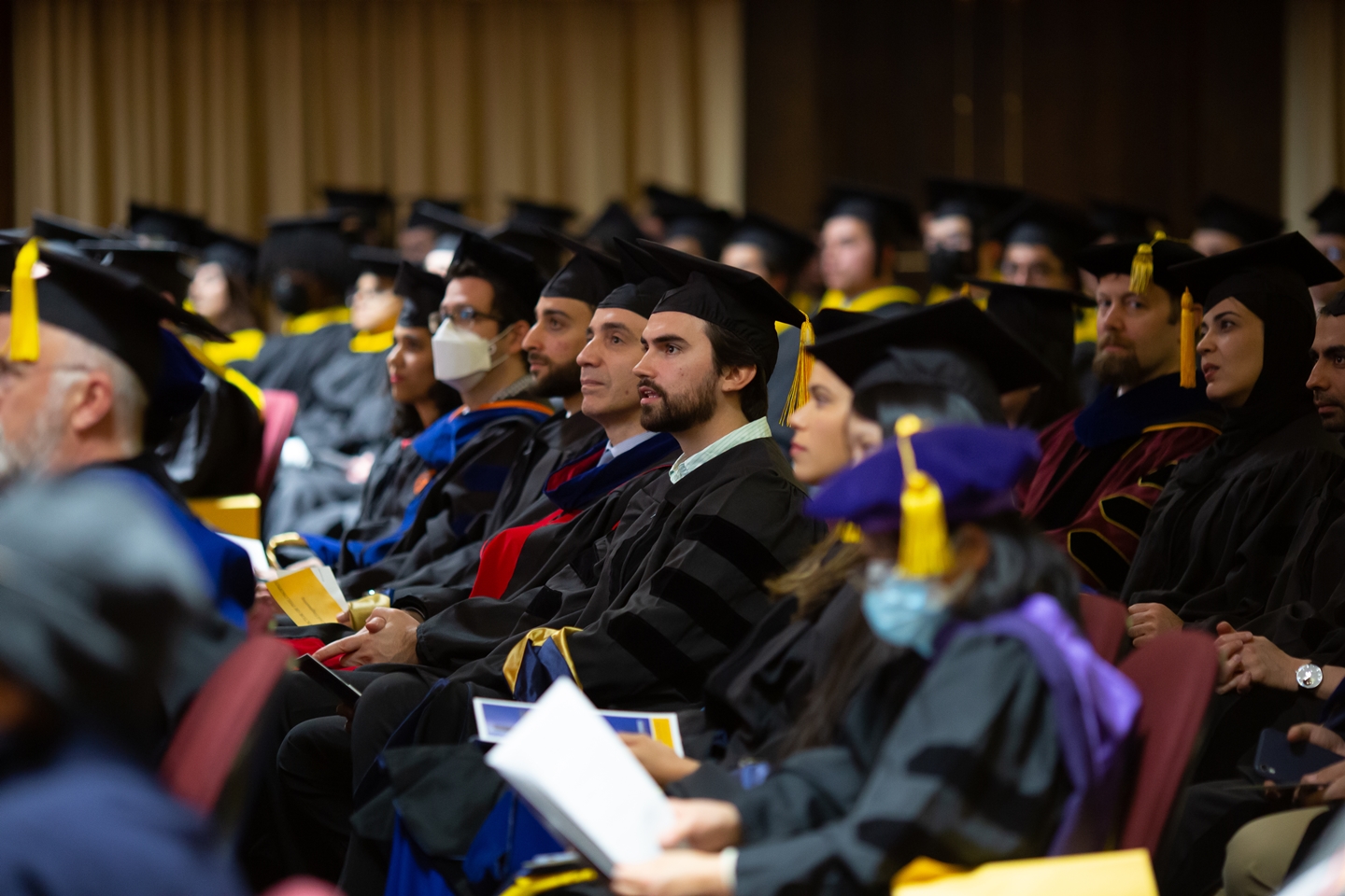 Graduates in cap and gown