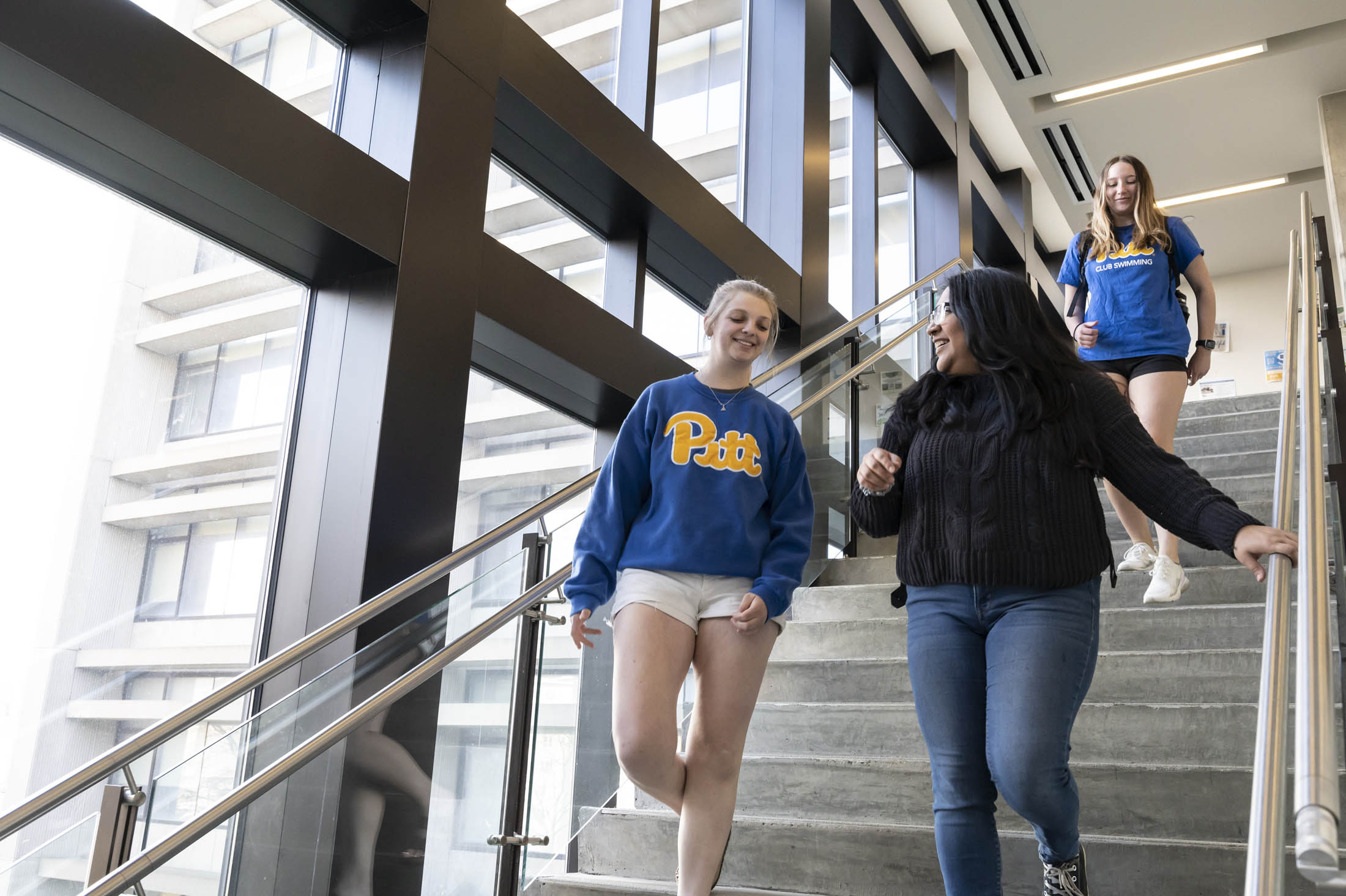 students on the benedum stairwell