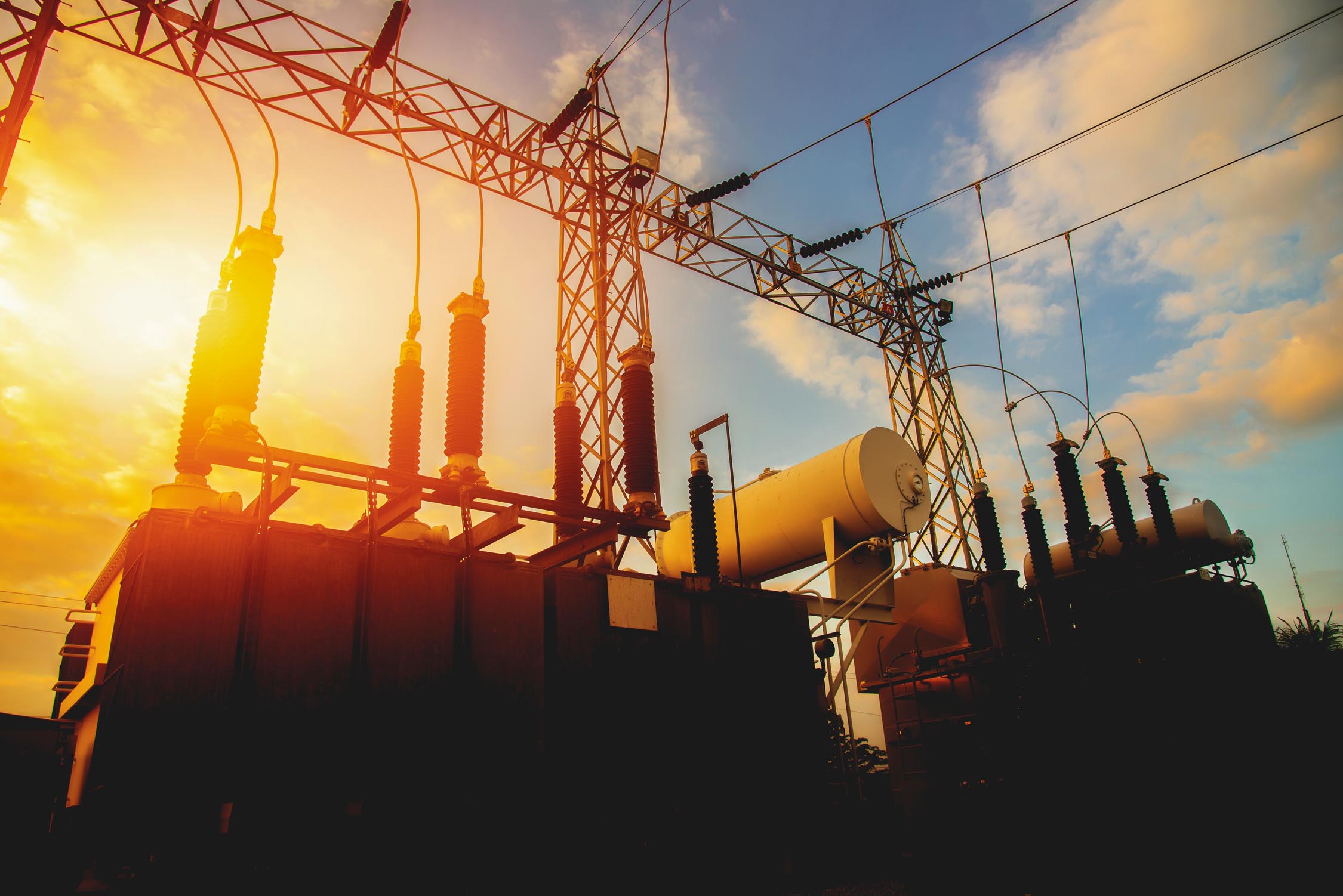 An electrical station at sunset