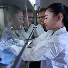  A technician adjusting lab equipment