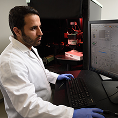  A technician adjusting lab equipment