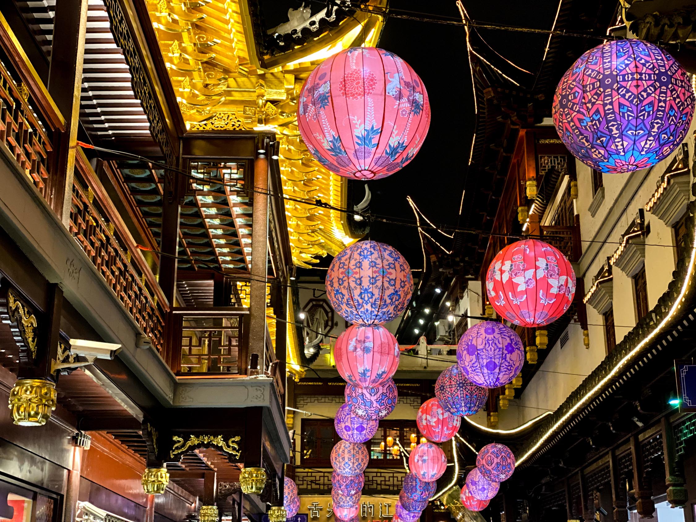 A street lined with paper lanterns