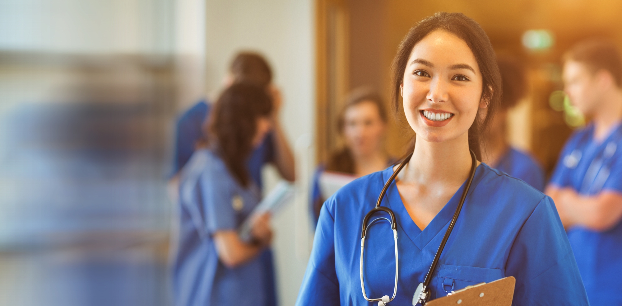 Medical student smiling at camera in university